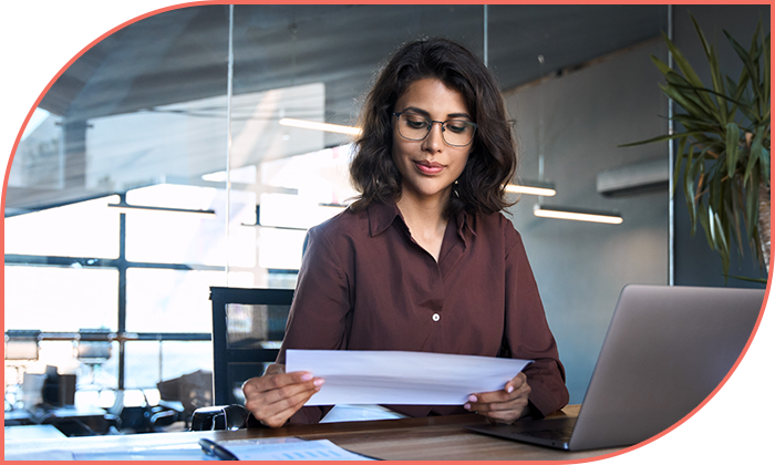 woman looking at documents